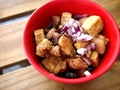 Bowl of chopped tofu and pork in soy sauce