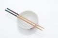 bowl with chopsticks isolated on a white background Royalty Free Stock Photo