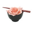 Bowl, chopsticks and rose