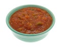 Bowl of chunky salsa sauce on a white background Royalty Free Stock Photo