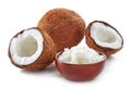 Bowl of coconut oil and fresh coconuts Royalty Free Stock Photo