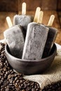 Bowl with coffee flavored popsicles. Cold dessert, cappucino popsicle, pop ice