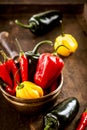 Bowl of colorful fresh chili and sweet peppers Royalty Free Stock Photo