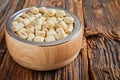 Bowl of commercial doggy biscuits sausage rolls