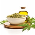 A bowl containing oil, hemp seeds, and marijuana leaves, presented in isolation against a white background, creates a visually Royalty Free Stock Photo