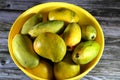 Bowl contains Egyptian fresh mango fruit with tropical delicacy, mangoes are nutritionally rich fruit with distinctive flavor, Royalty Free Stock Photo