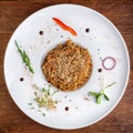 Bowl of cooked long grain brown rice decorated with sesame Royalty Free Stock Photo