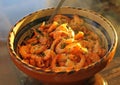 Bowl of cooked prawns