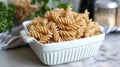 Delicious Whole Wheat Rotini Pasta in a White Bowl Royalty Free Stock Photo