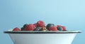 Bowl with corn rings and berries Royalty Free Stock Photo