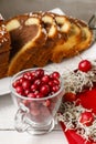 Bowl of cranberries and christmas coconut cake