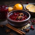 a bowl of cranberry sauce with spices and lemons