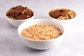 Bowl of Crawfish Etouffee with Gumbo and Red Beans and Rice on the Side Royalty Free Stock Photo