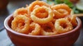 A bowl of crispy, golden fried snacks, perfect for serving with dips or fillings Royalty Free Stock Photo