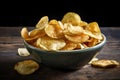 bowl of crispy and salted potatoes chips, ready to be devoured