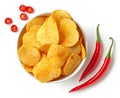 Bowl of crispy wavy potato chips or crisps with chili pepper flavor Royalty Free Stock Photo