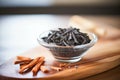 bowl of crushed charcoal natural tooth whitener Royalty Free Stock Photo