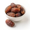 Bowl of dates fruit isolated on white background Royalty Free Stock Photo
