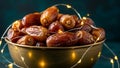 Bowl of Dates with String Lights Royalty Free Stock Photo