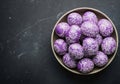 Bowl of decorative purple easter eggs with intricate white patterns Royalty Free Stock Photo