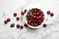 Bowl of delicious cherries on marble background Royalty Free Stock Photo