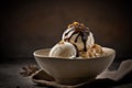 Bowl of delicious coffee ice cream on dark background