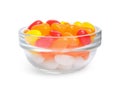 Bowl of delicious color jelly beans on white Royalty Free Stock Photo