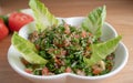 A bowl of delicious fresh Tabbouleh tabbouli salad with parsley, mint, tomato, onion, olive oil and lemon juice Royalty Free Stock Photo