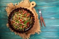 A bowl of delicious fresh tabouli with parsley, mint, tomato, onion, olive oil, lemon juice, and bulgar wheat. Traditional Royalty Free Stock Photo