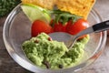 Bowl with delicious guacamole and vegetables, closeup Royalty Free Stock Photo