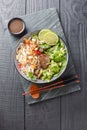 Bowl of delicious mixed beef noodle salad Pho Tron closeup. Vertical top view