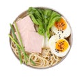 Bowl of delicious ramen with meat isolated on white, top view. Noodle soup