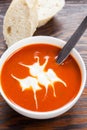 A bowl of delicious tomato soup with creme fraiche