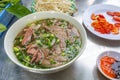 Bowl of delicious Vietnamese beef pho noodles soup Royalty Free Stock Photo