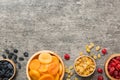 Bowl with different dried fruits on table background, top view. Healthy lifestyle with copy space Royalty Free Stock Photo