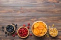 Bowl with different dried fruits on table background, top view. Healthy lifestyle with copy space Royalty Free Stock Photo