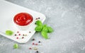 Bowl dip of ketchup or red tomato sauce on kitchen table Royalty Free Stock Photo