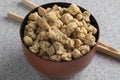 Bowl with dried soya chunks close up