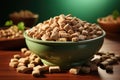 Bowl of dry dog food on a wooden table with green background Royalty Free Stock Photo
