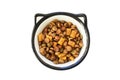 Bowl with dry pet food on white background. Pet color nutrition food