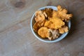 Bowl of edible chanterelle mushrooms, seasonal food ingredient, copy space