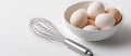 Bowl of Eggs With Whisk Royalty Free Stock Photo