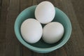 bowl of fresh whole eggs on a wooden background isolated Royalty Free Stock Photo