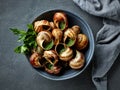 bowl of escargot snail filled with garlic and parsley butter Royalty Free Stock Photo