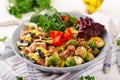 Bowl with Farfalle pasta, Brussels sprouts with bacon Royalty Free Stock Photo