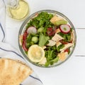 Bowl of Fattoush Lebanese Salad with pita bread