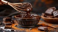 A bowl filled with chocolate being mixed with a whisk Royalty Free Stock Photo