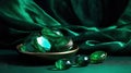 a bowl filled with green crystal stones next to a green cloth