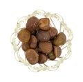 Bowl filled with organic whole shelled roasted chestnuts