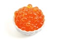 A Bowl Filled with Popping Boba on a White Background